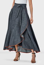 Contrast trim cotton chambray faux wrap skirt with tie waist and flared hem, model standing
