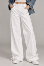 women's white wide-leg denim pants with ankle tie detail
