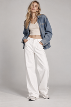 women's white wide-leg denim pants with ankle tie detail