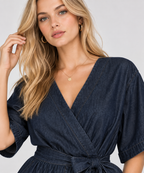 women's dark blue denim wrap romper with tie waist and cuffed shorts

Product Description