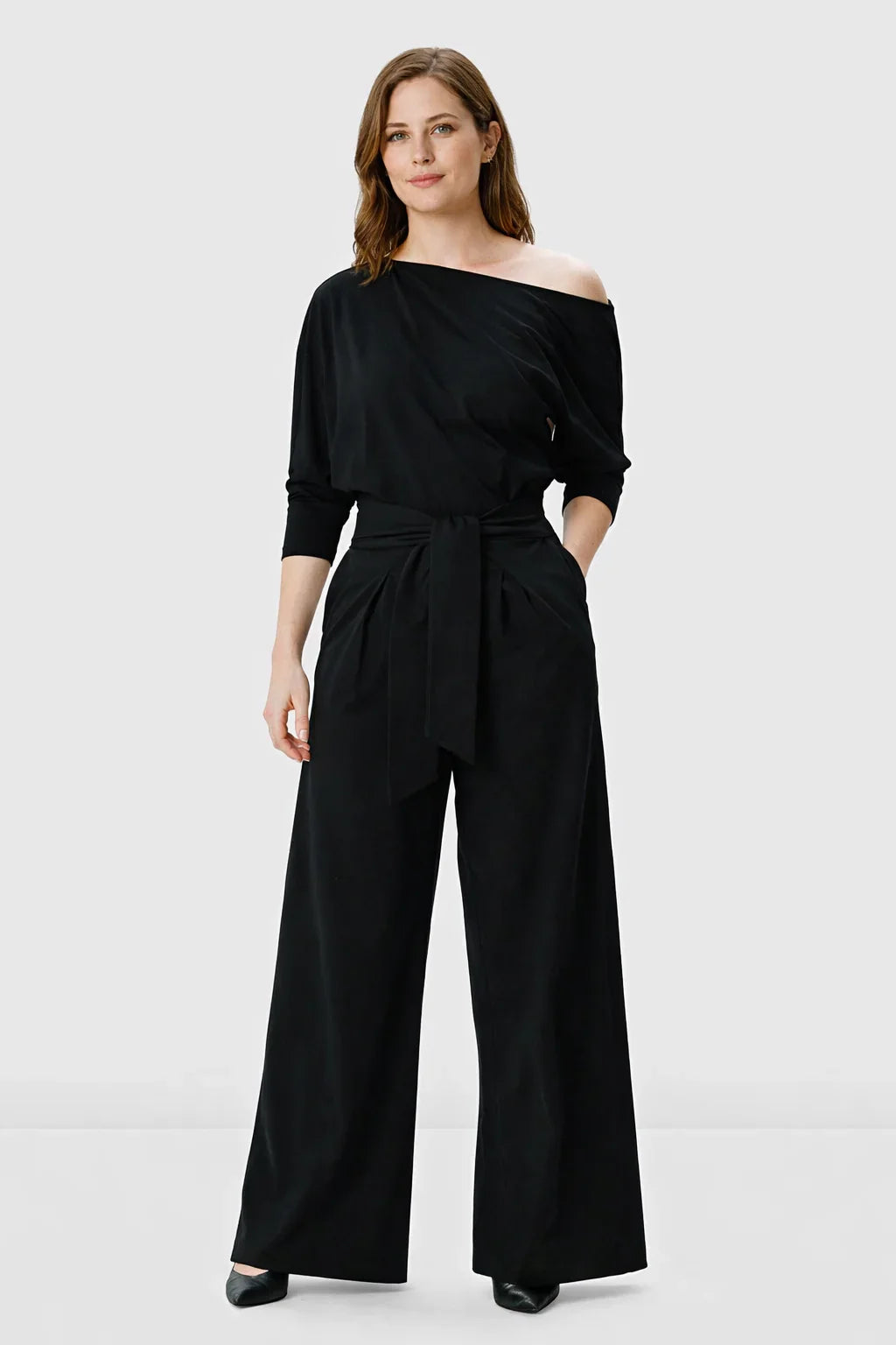Nams-Ropa asymmetric shoulder cotton jersey palazzo jumpsuit with wide-leg design and soft drape, styled for a sleek, modern look.