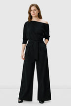 Nams-Ropa asymmetric shoulder cotton jersey palazzo jumpsuit with wide-leg design and soft drape, styled for a sleek, modern look.
