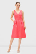 Sleeveless V-neck empire A-line dress in dupioni fabric with banded waist, perfect for wedding guests, by Nams-Ropa.