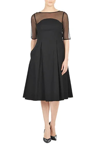 Nams-ropa Grace square-neck sleeveless midi dress displayed on a hanger, showcasing its simple, elegant design and smooth fabric.