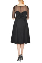 Simple Grace square-neck sleeveless midi dress by nams-ropa, featuring a fitted bodice and flowing skirt in a neutral tone.