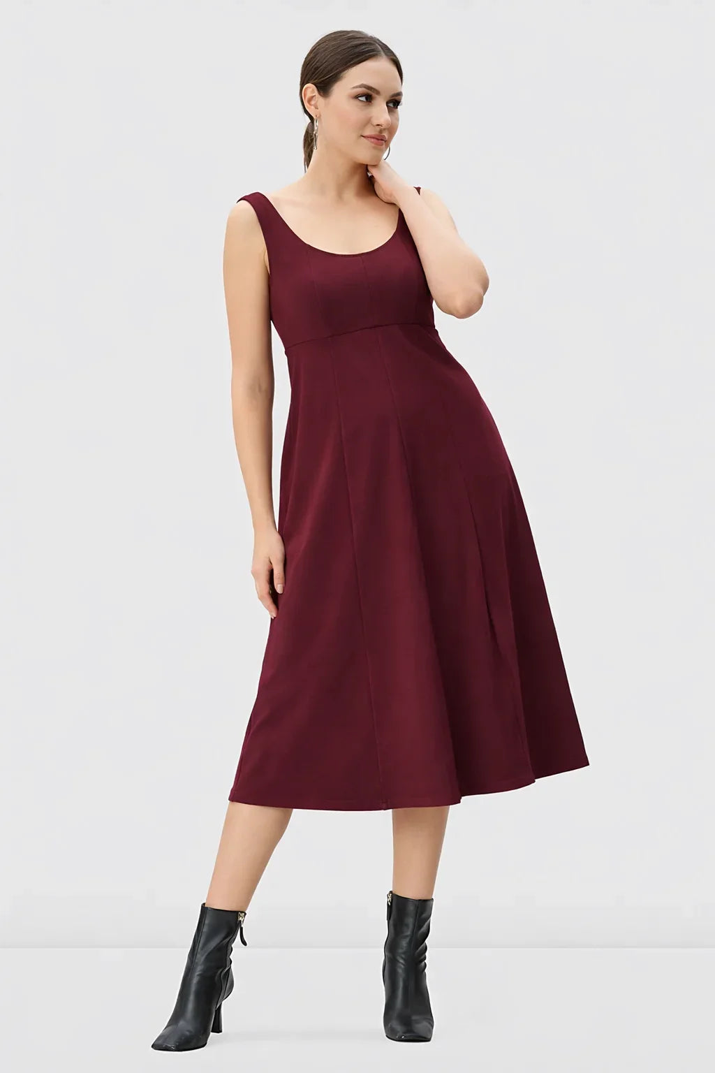 Sleeveless scoop-neck midi dress by Nams-Ropa featuring seamed cotton jersey fabric and empire waist design.
