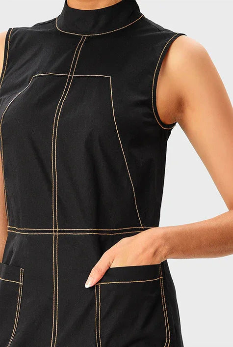 Sleeveless wide-leg cotton poplin jumpsuit with high neck and contrast stitching from Nams-Ropa, showing front view and relaxed fit.