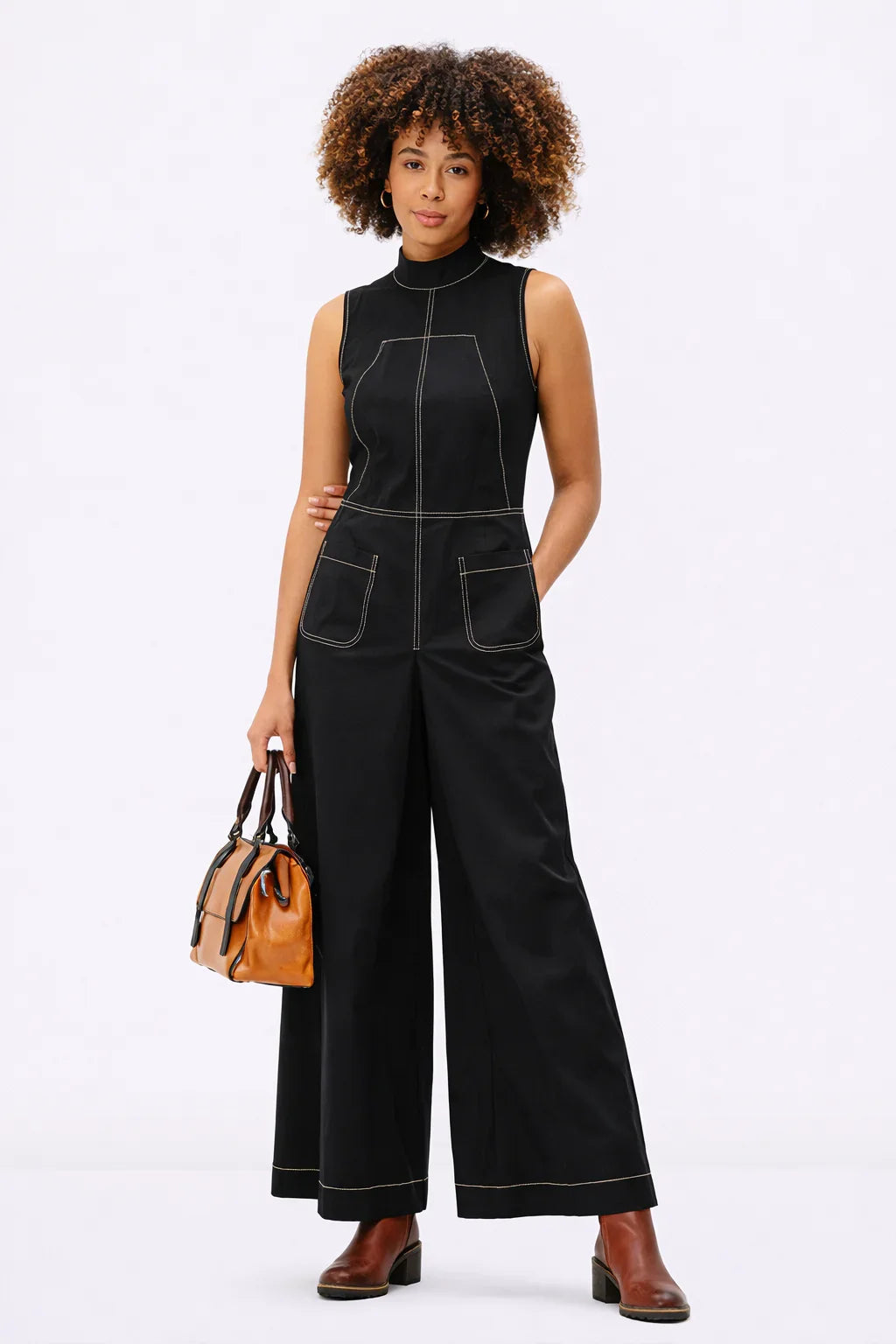 Sleeveless wide-leg cotton poplin jumpsuit with high neck and contrast stitching, featuring a sleek, simple one-piece design by Nams Ropa.