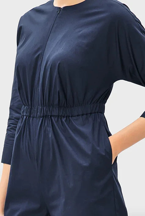 Cotton poplin zip-front jumpsuit with elastic waist and straight-leg design, ideal for casual or workwear, by Nams-Ropa.