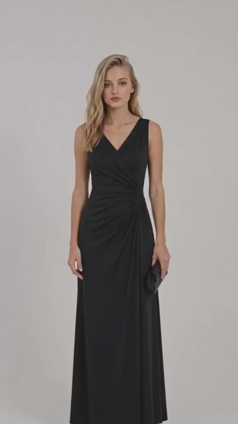 Black French crepe ruched maxi dress with V-neckline, sleeveless wrap-style bodice, gathered waist, and flowing floor-length skirt worn by a female model.
